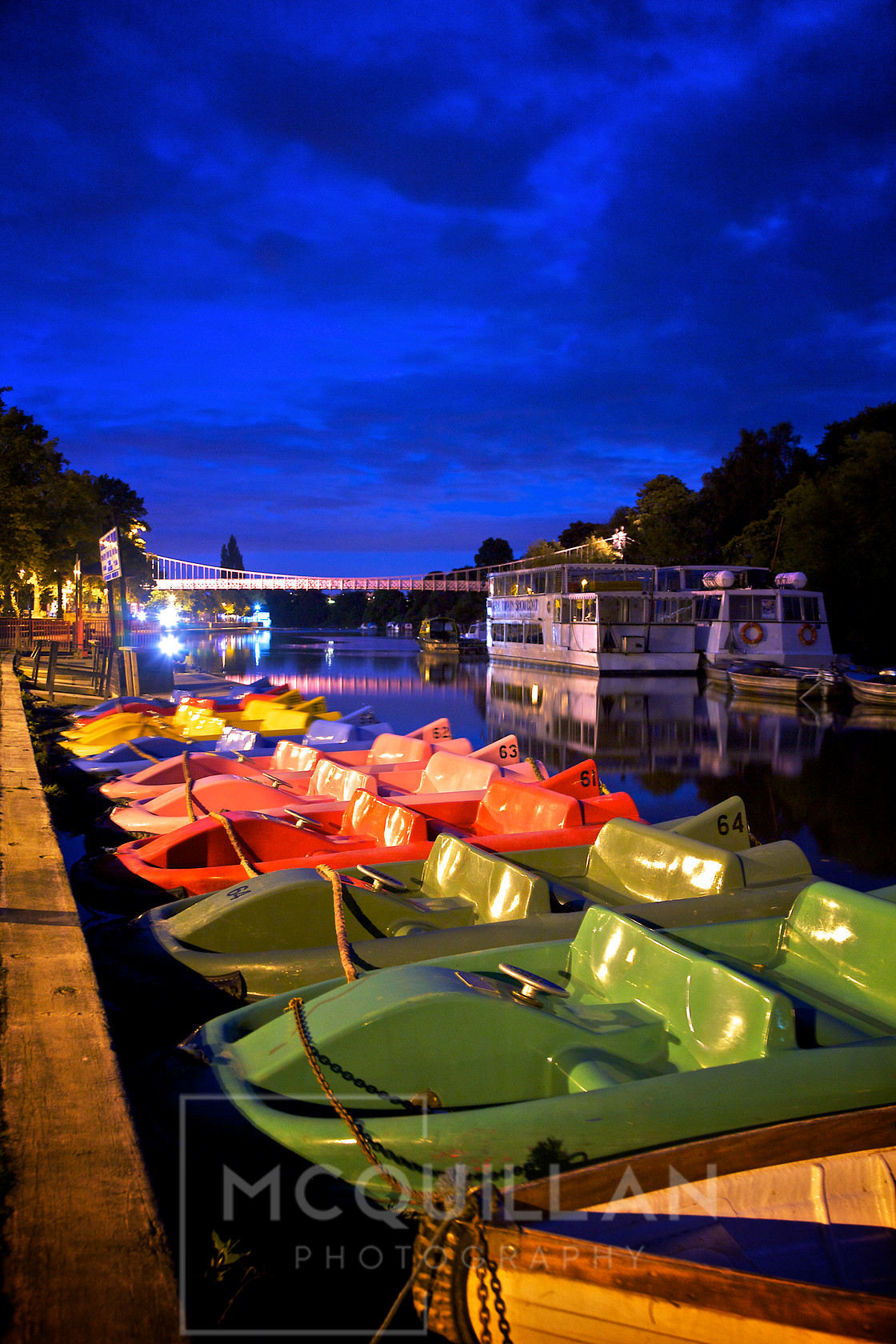 Chester Riverside at Night 6 
 Canon 5d ,Lseries Lenses 
 Keywords: Night, Boats, Bridge, Colour, Suspension Bridge